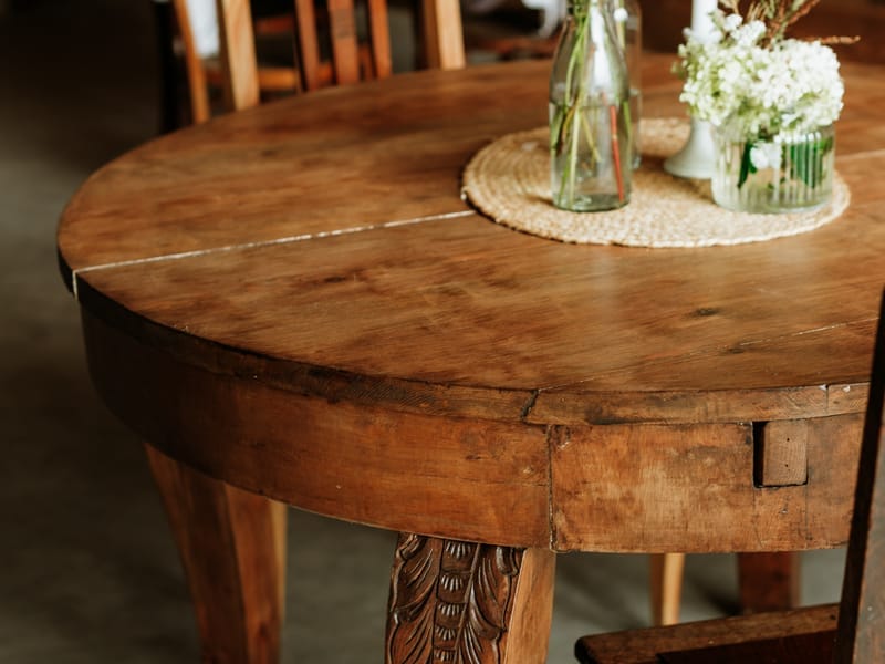 Furniture restoration project showcasing restored wooden table